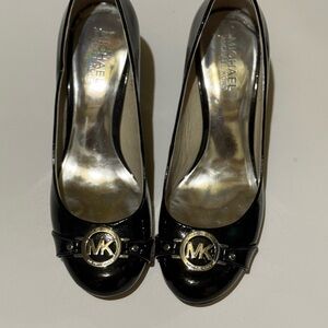 Michael Kors Black Patent Leather Pumps with MK Medallion